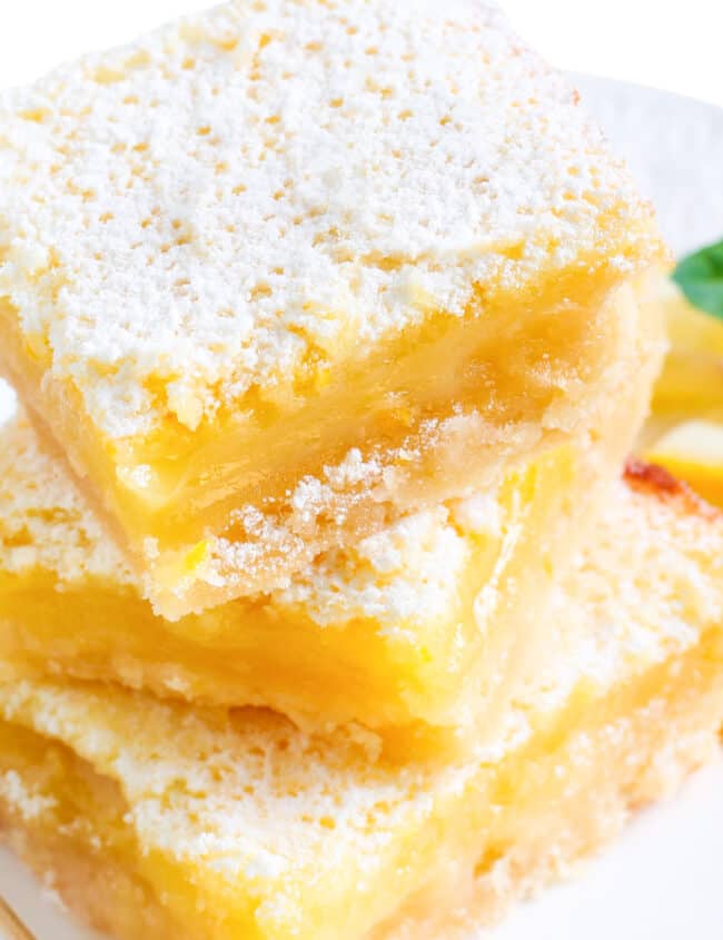 a pile of lemon squares