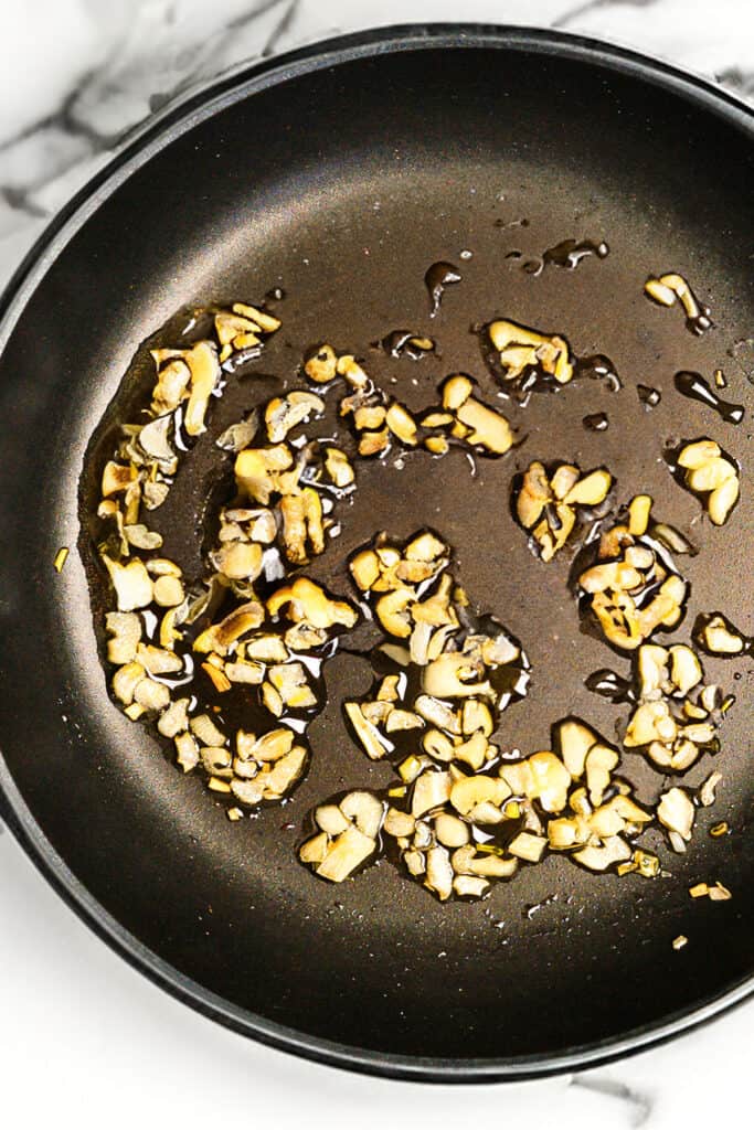 Sautéed Garlic and and oil in a pan.