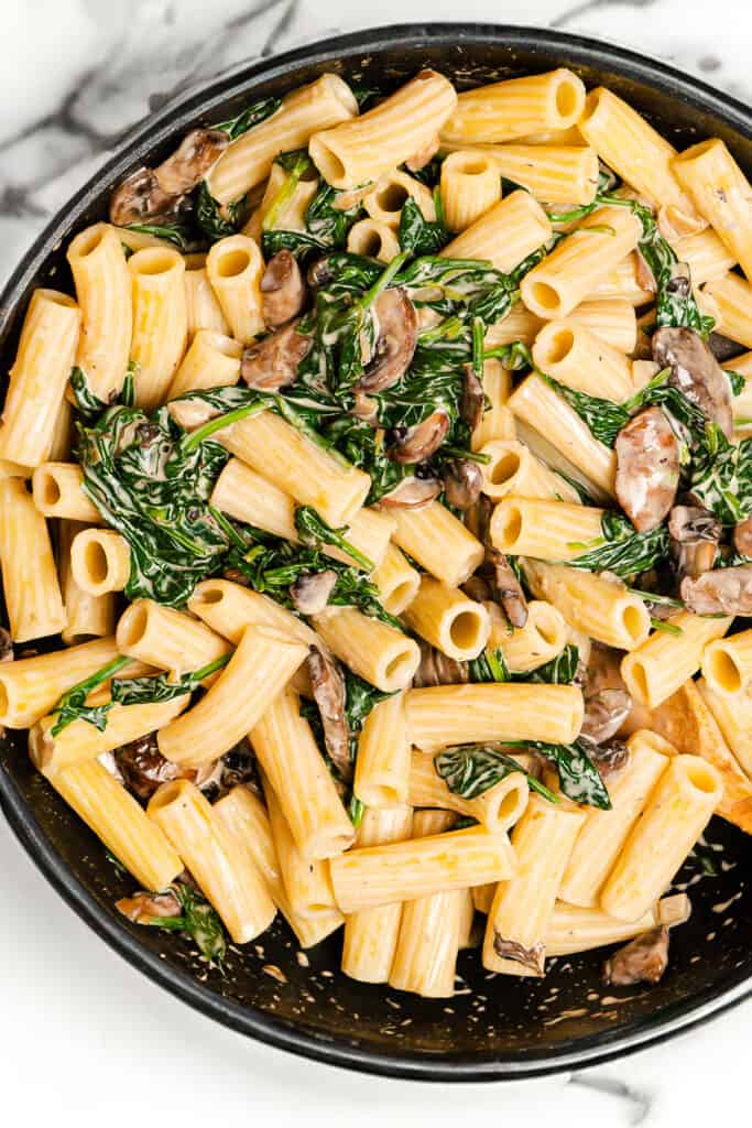 the finished Creamy Spinach Mushroom Pasta in the pan ready to serve.