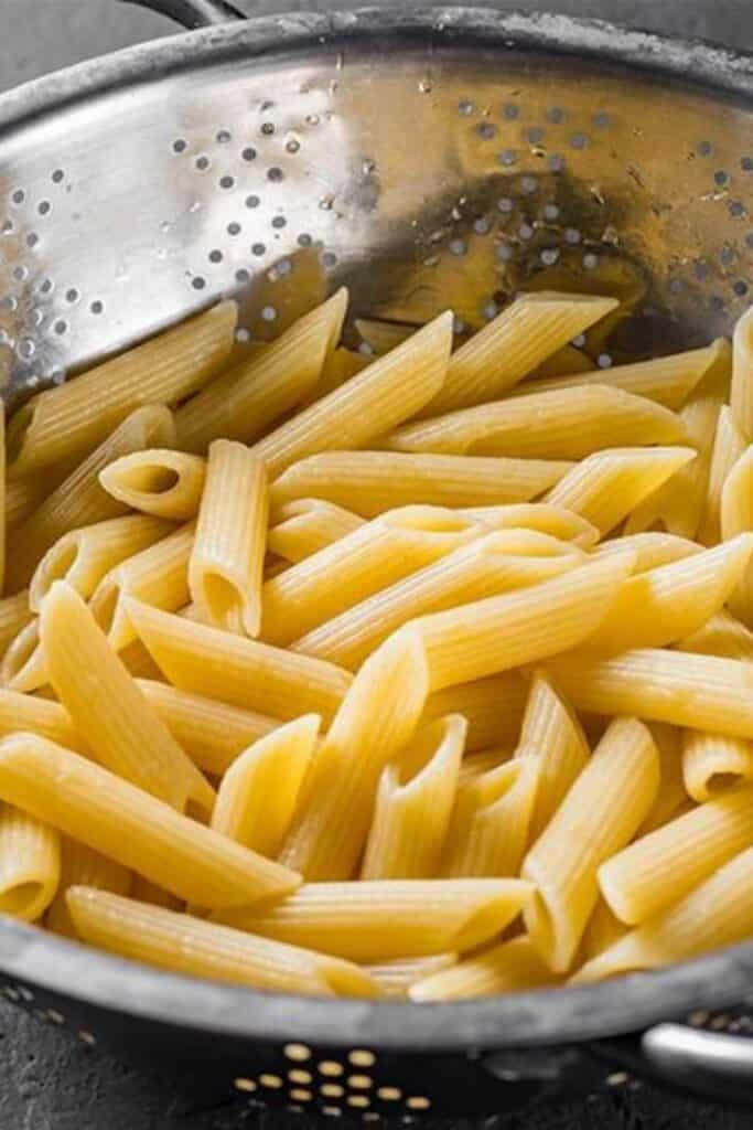 drained pasta in a strainer