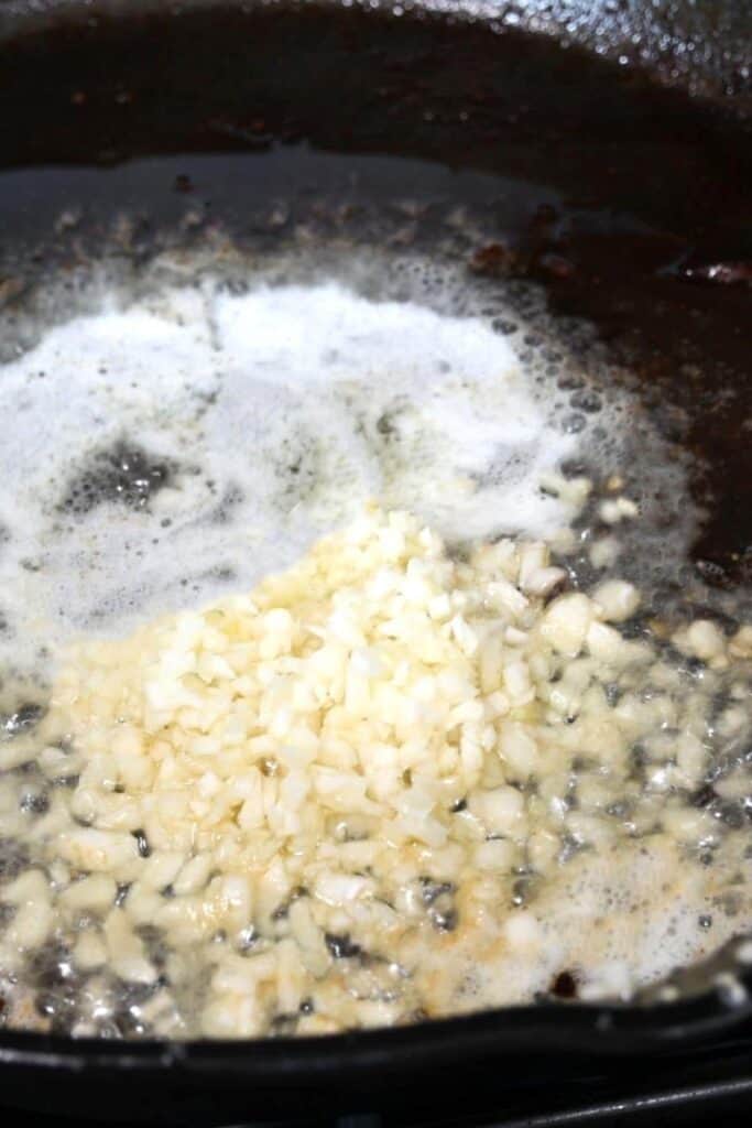 garlic cooking in a pan