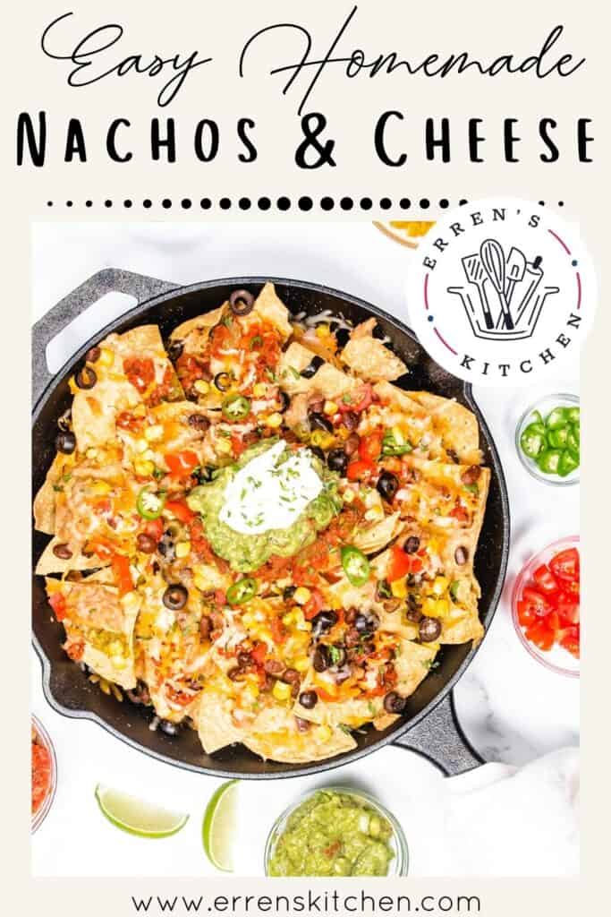 an overhead image of of a cast iron pan with nachos