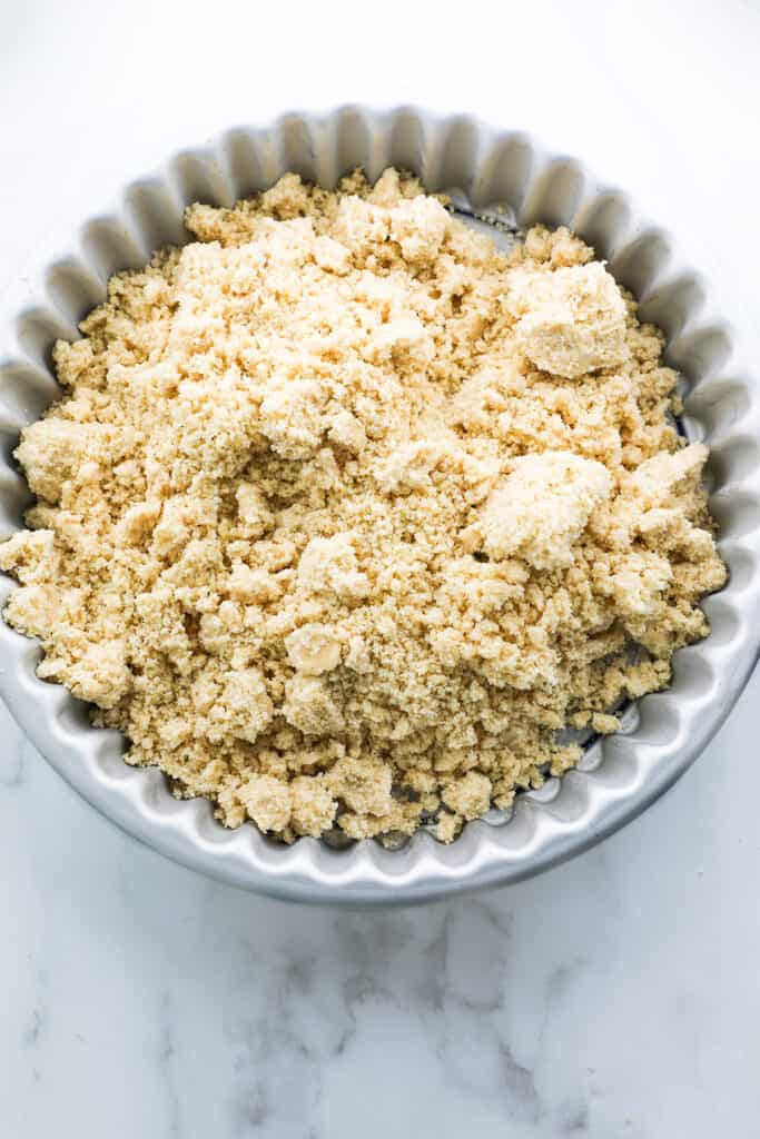 the mixture for the Shortbread Crust {Sablé Breton}added to the tart pan
