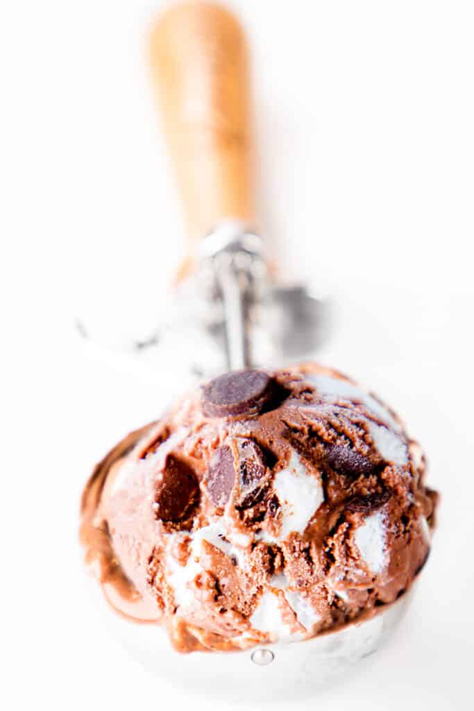 a scoop of Chocolate Marshmallow Ice cream in an ice cream scooper