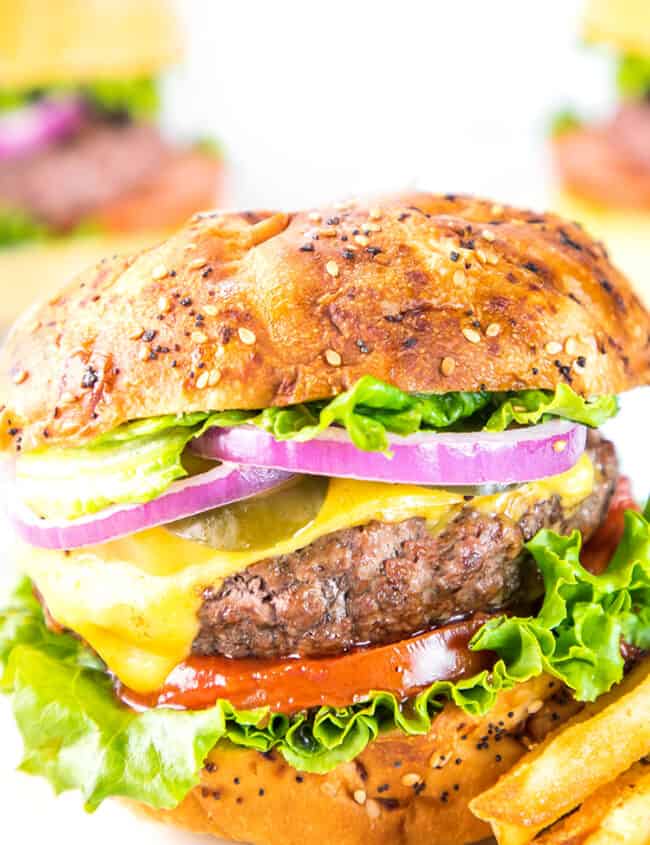 a hamburger made with The Best Hamburger Recipe piled high with toppings