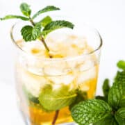 a sprig of mint in a Mint Julep Cocktail