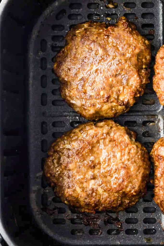 cooked pork burgers  in an air fryer