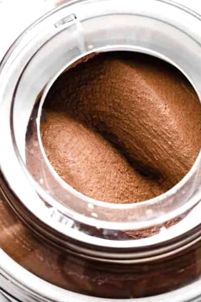 thickened dark chocolate ice cream in an ice cream maker