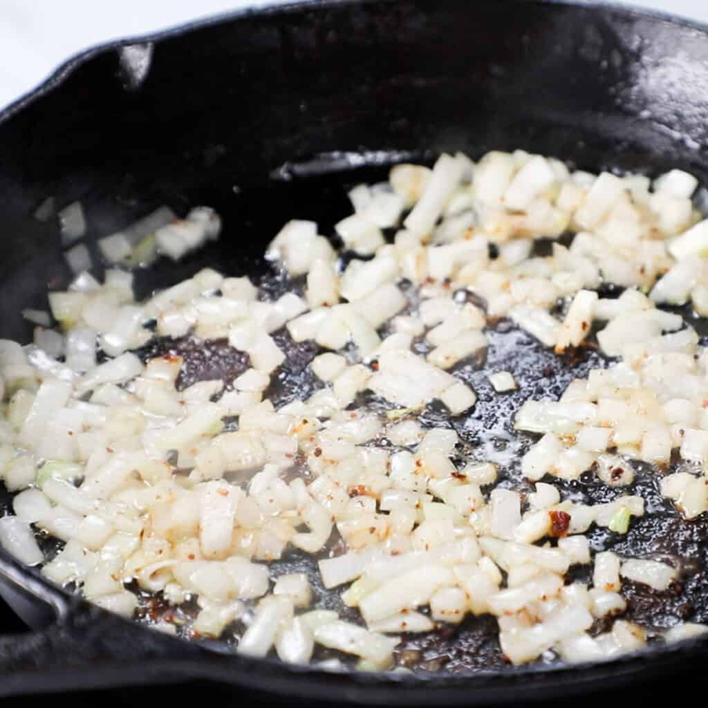 onions cooking in a pan