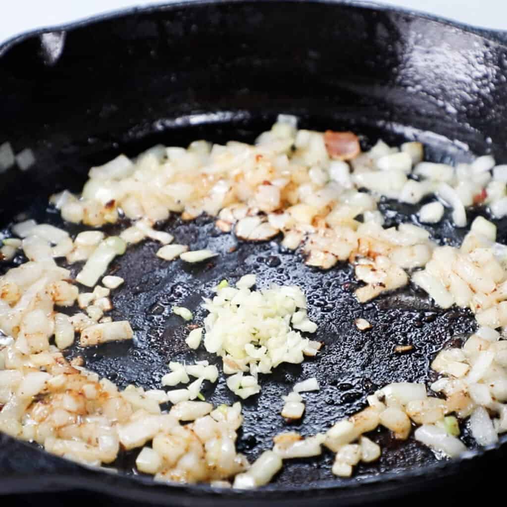 garlic added to the pan with the onions