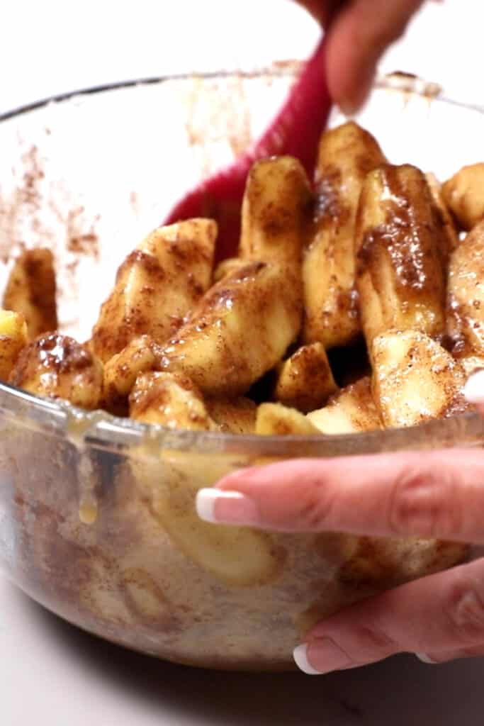 the coated apples in a bowl