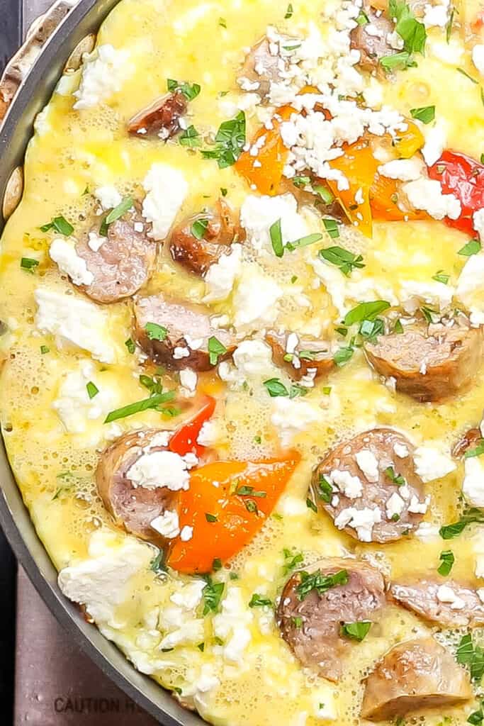 the Sausage and Egg Frittata with puffed sides in the pan