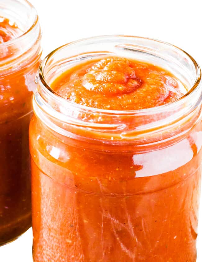 two glass jars filled with Fresh Tomato Sauce