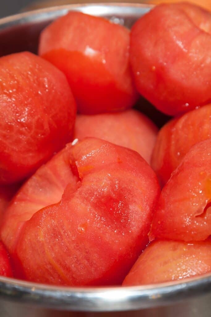 a bowl of peel tomatoes