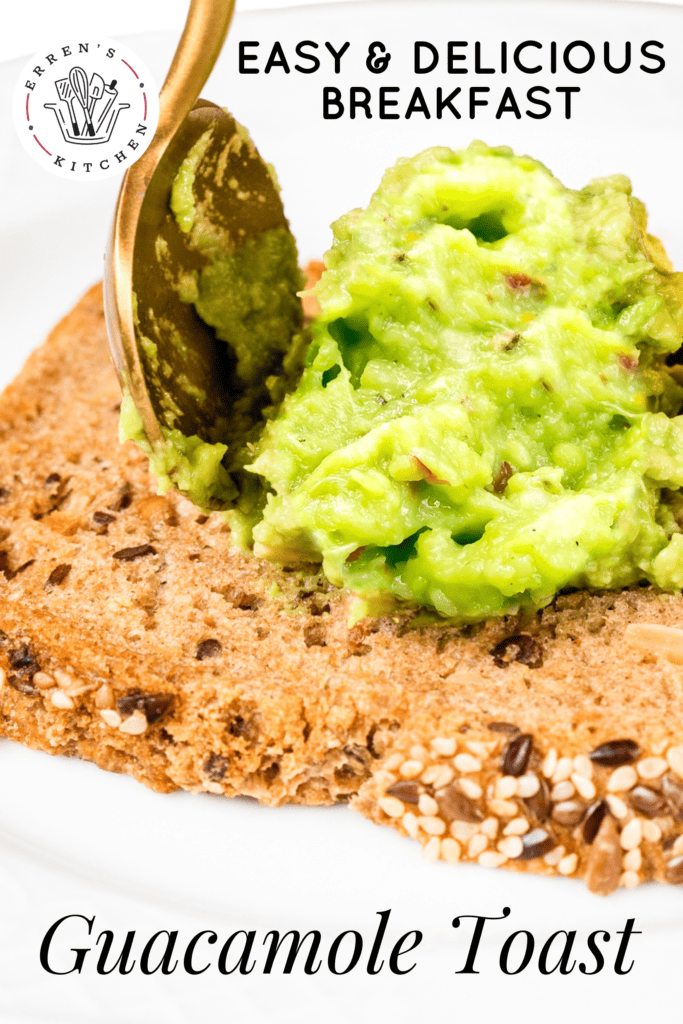 Homemade guacamole being placed onto toast with a spoon.