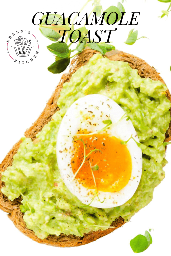 A piece of bread toasted to perfection with a layer of homemade guacamole spread on top, and a soft boiled egg cut in half laying right in the center.
