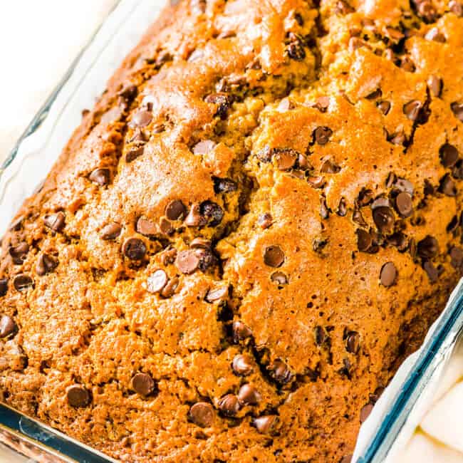 a close up loaf of Easy Pumpkin Bread with chocolate chips