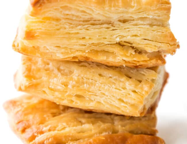three puffy baked slices of Easy Puff Pastry {Rough Puff Pastry} on top of each other