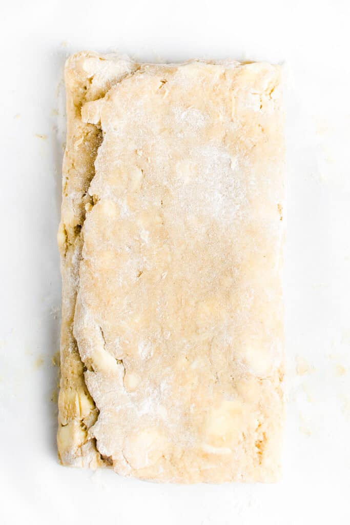the folded dough on a board
