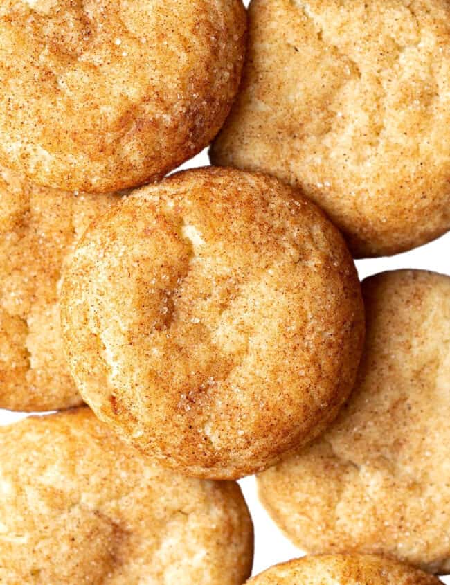 a stack of snickerdoodles covered with cinnamon and sugar