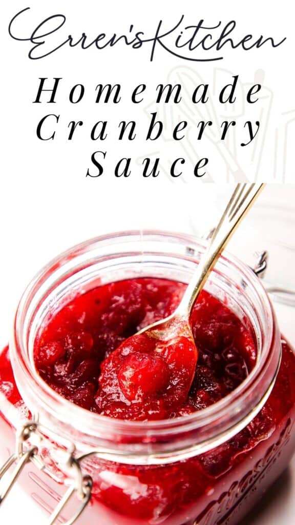 a spoon of Homemade Fresh Cranberry Sauce in a glass jar