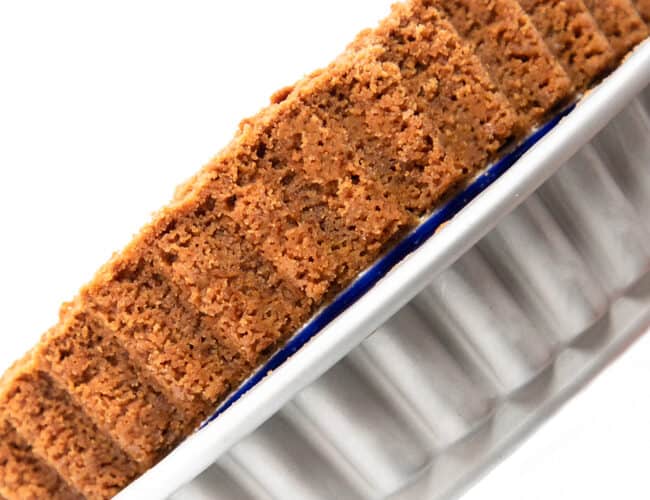 the other edge of a Graham Cracker Crust being pushed from a pan