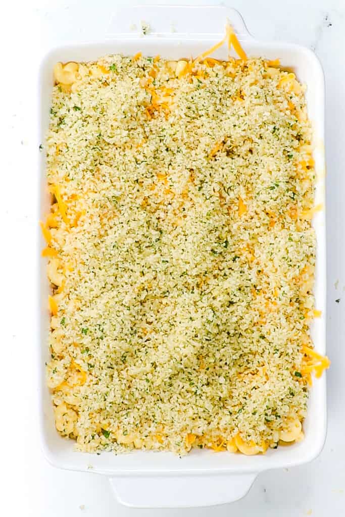 the breadcrumb mixture added to the mac and cheese mixture