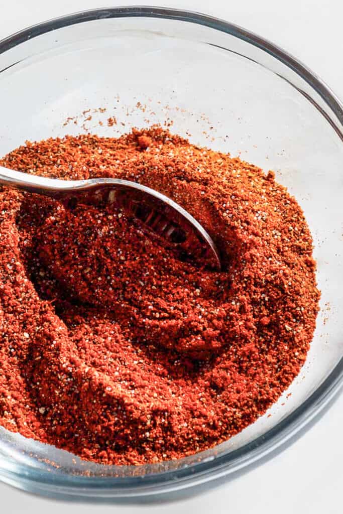the paprika mixed with the pepper, sugar and salt