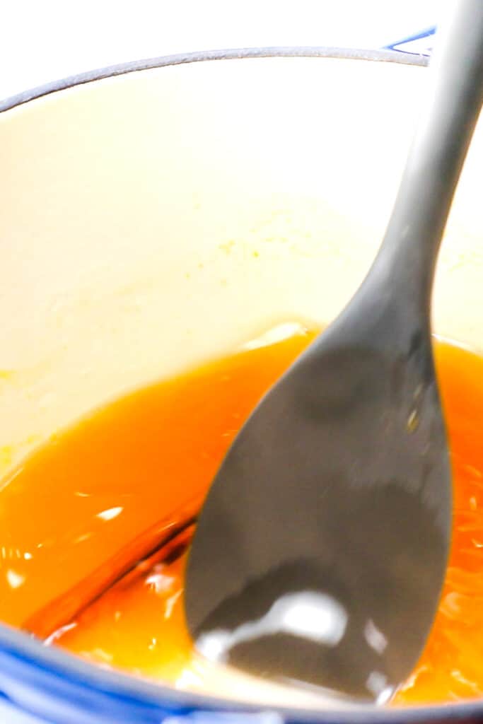 the mixture in a pot cooking