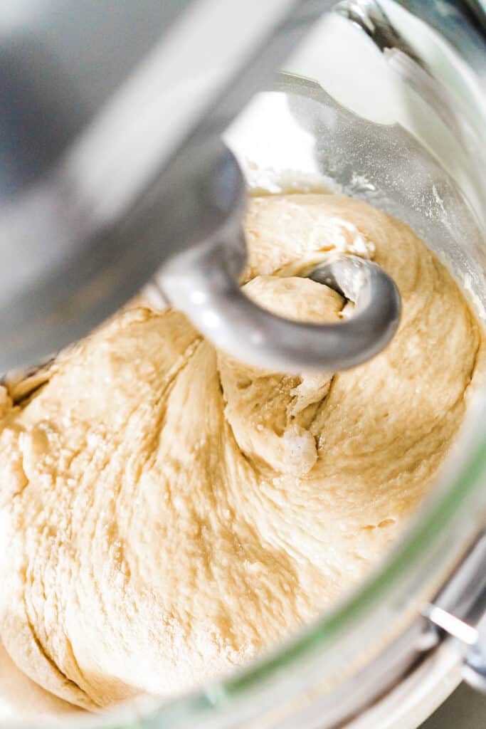 the dough for the Homemade Yeast Dinner Rolls formed in the bowl