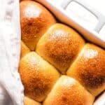 freshly baked Homemade Yeast Dinner Rolls in a white pan