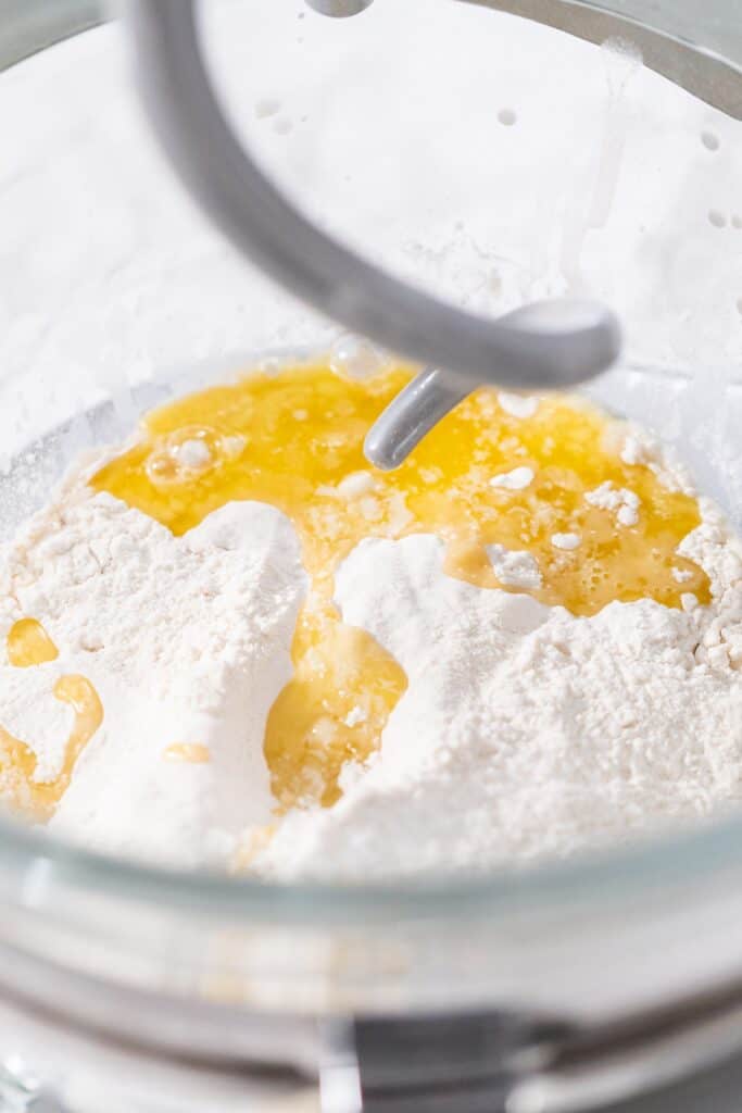 the flour added to the liquid ingredients in the bowl