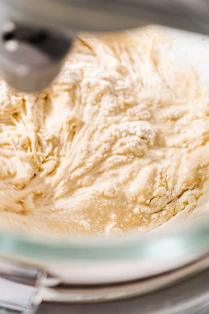 half the flour mixed with the egg mixture