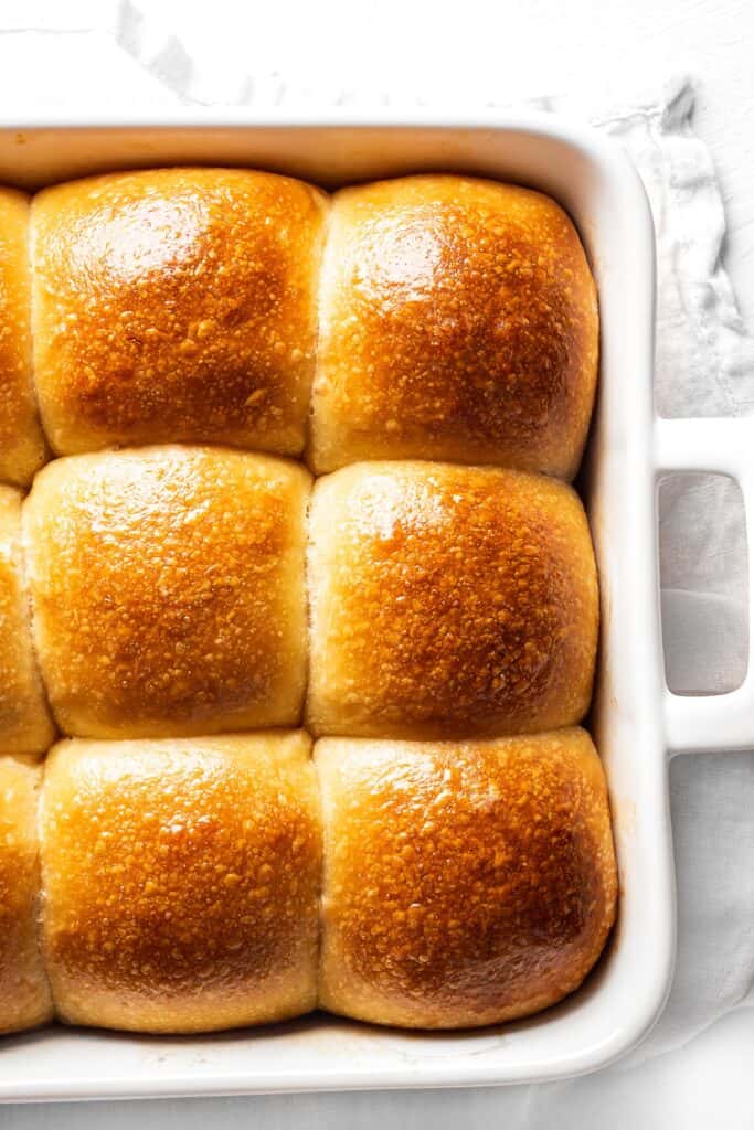 the baked Homemade Yeast Dinner Rolls in the pan