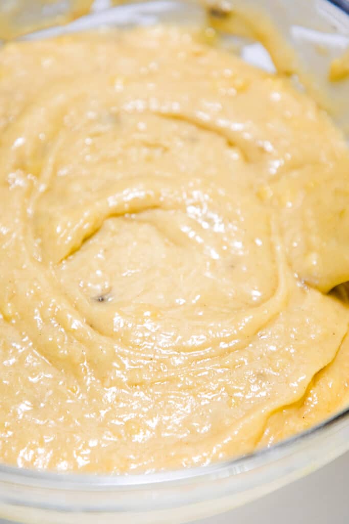 the batter for Cinnamon Banana Crumb Muffins in a bowl