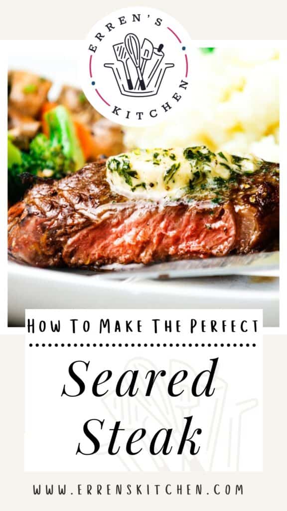 Pan fried steak on a plate topped with butter and mashed potatoes in the background