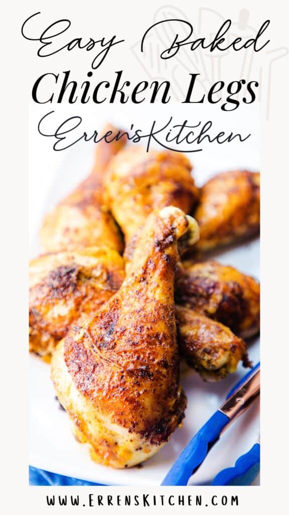 a white serving platter piled with baked chicken legs