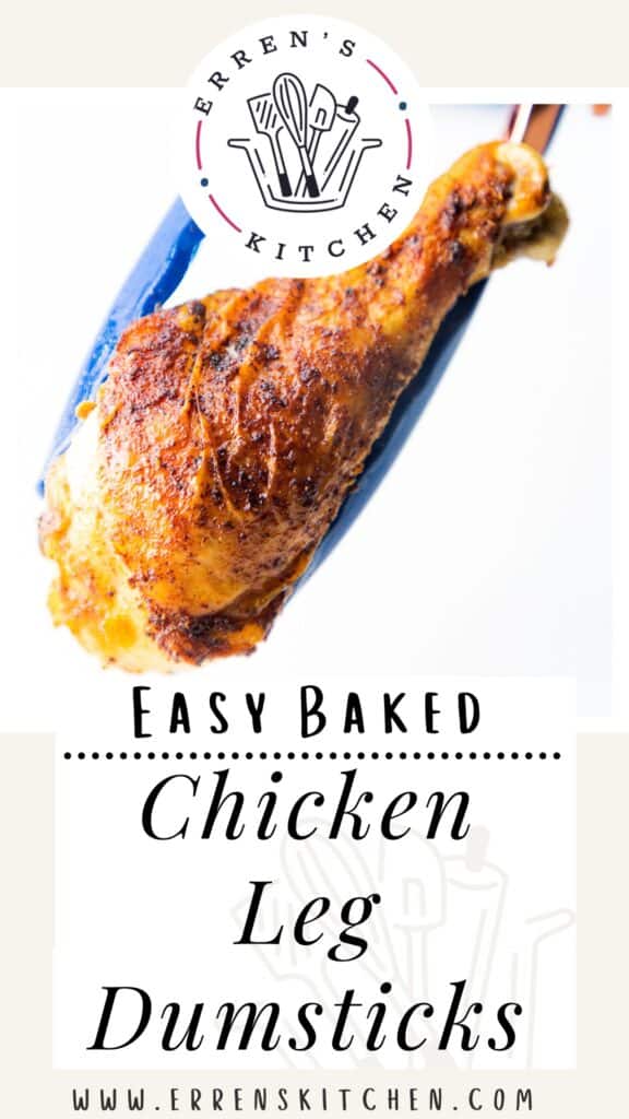 a pair of tongs holding a baked chicken leg