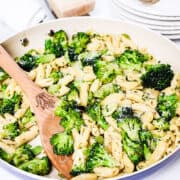 a serving spoon in a big pan of Cavatelli and Broccoli