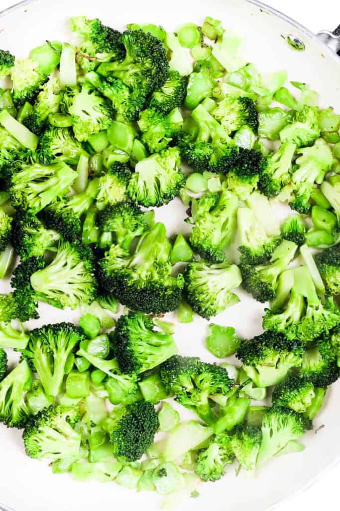 the broccoli florets added to the pan with the stems