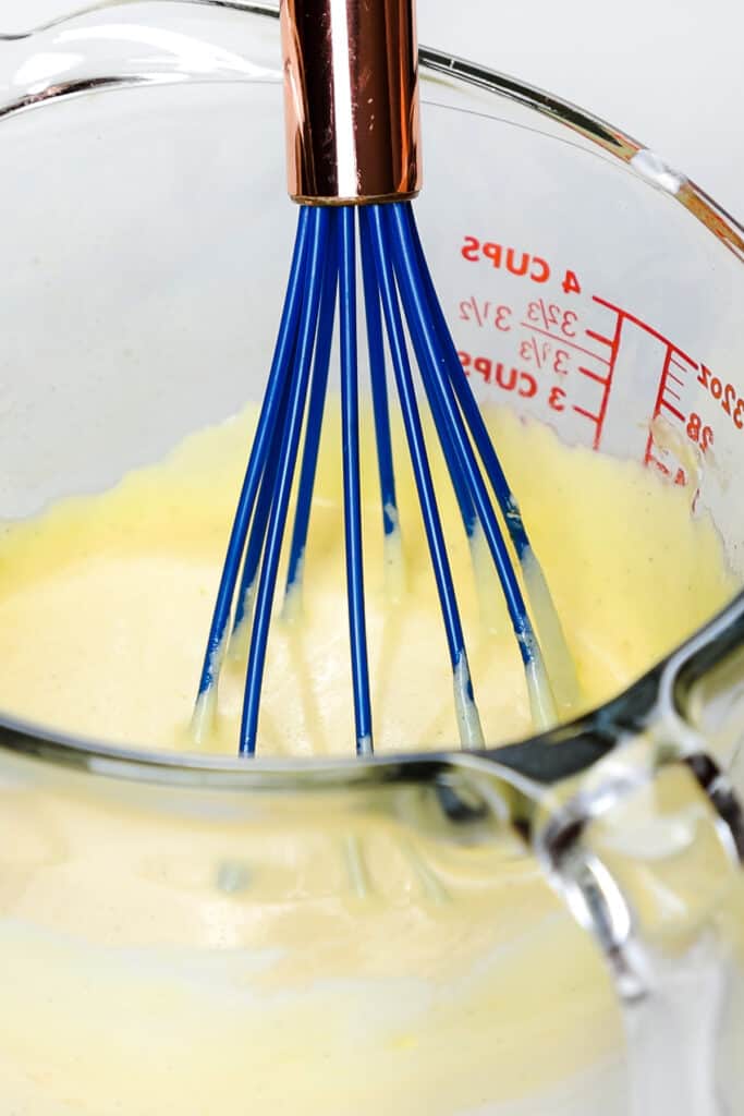 the wet ingredients mixed together in a glass jug