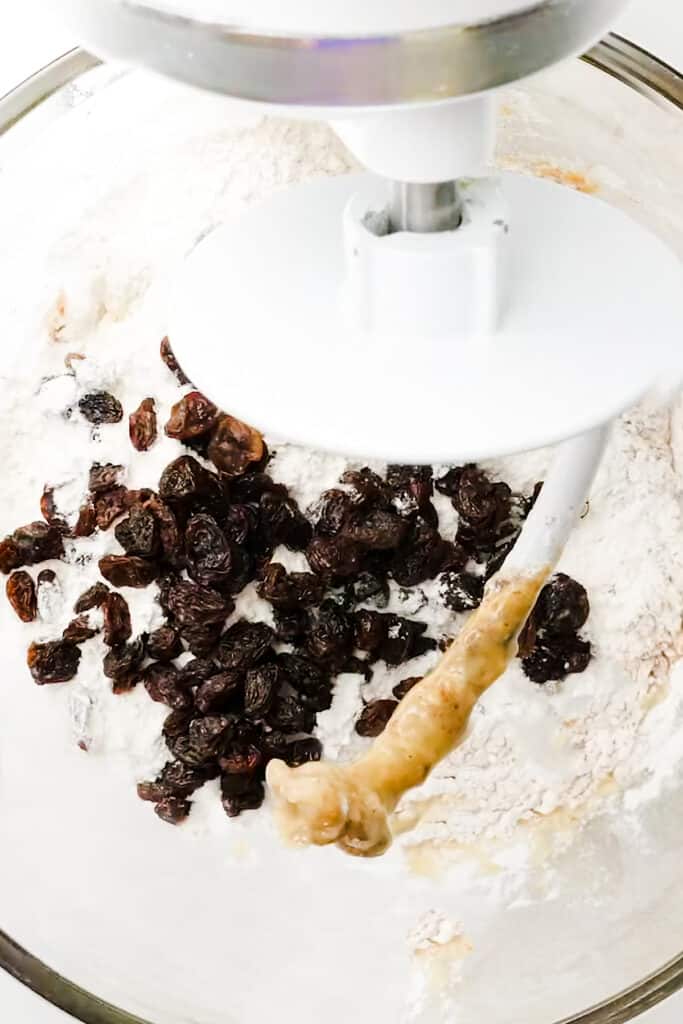 the raisins and half the flour added to the bowl