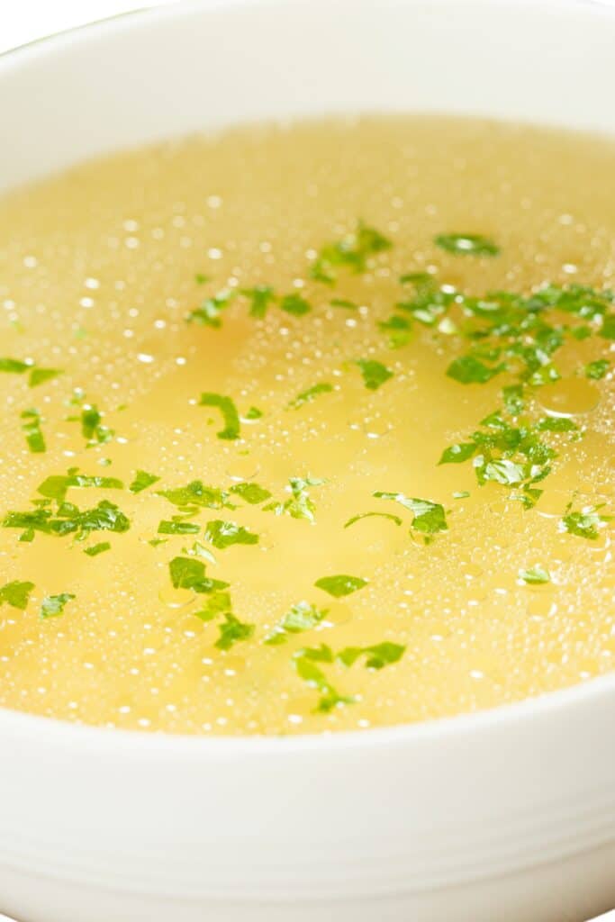 a close up image of a bowl of dashi broth