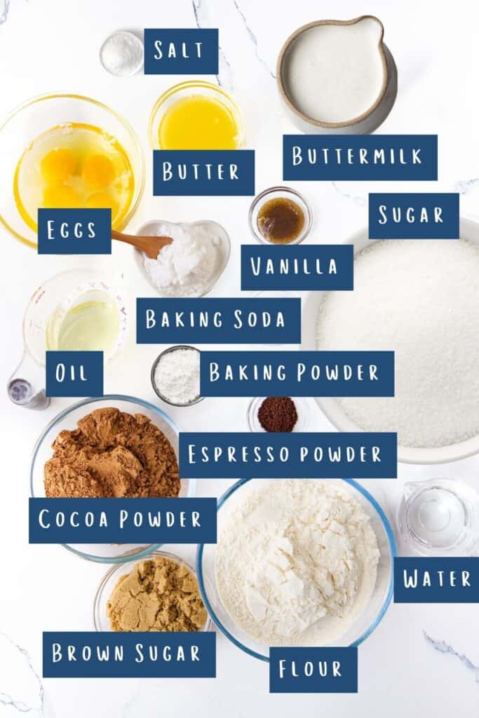 all of the ingredients for chocolate easter cake laid out on a table