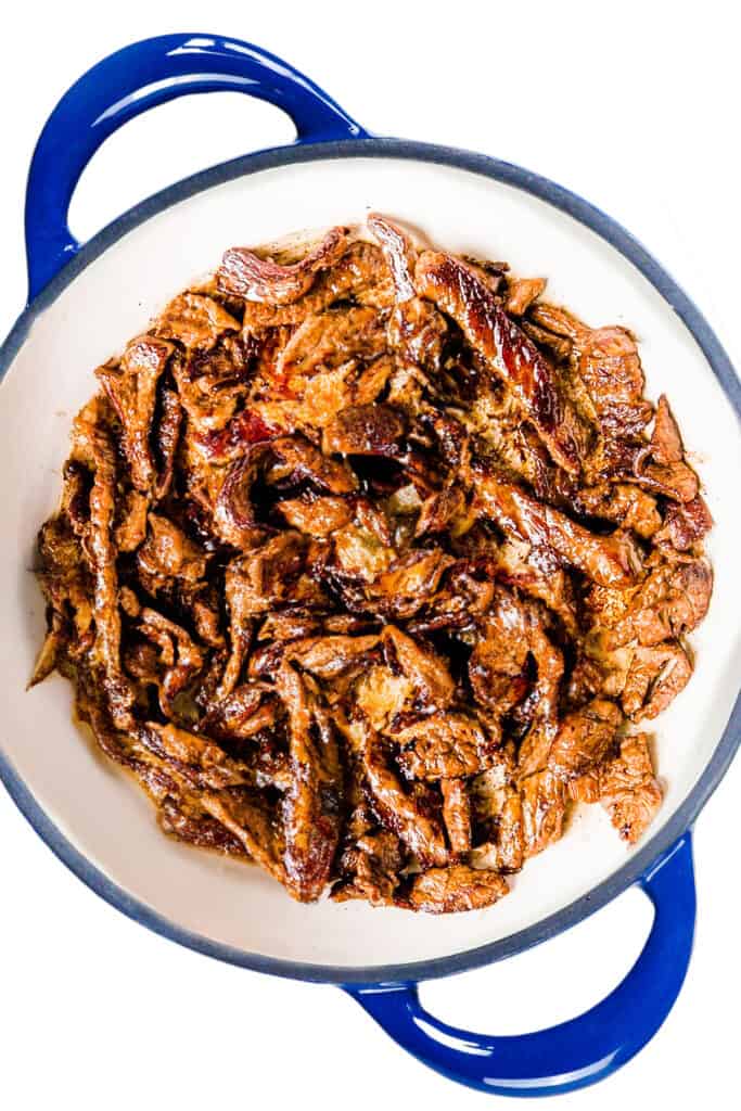 The seared meat for Easy Beef Stroganoff in the pan.