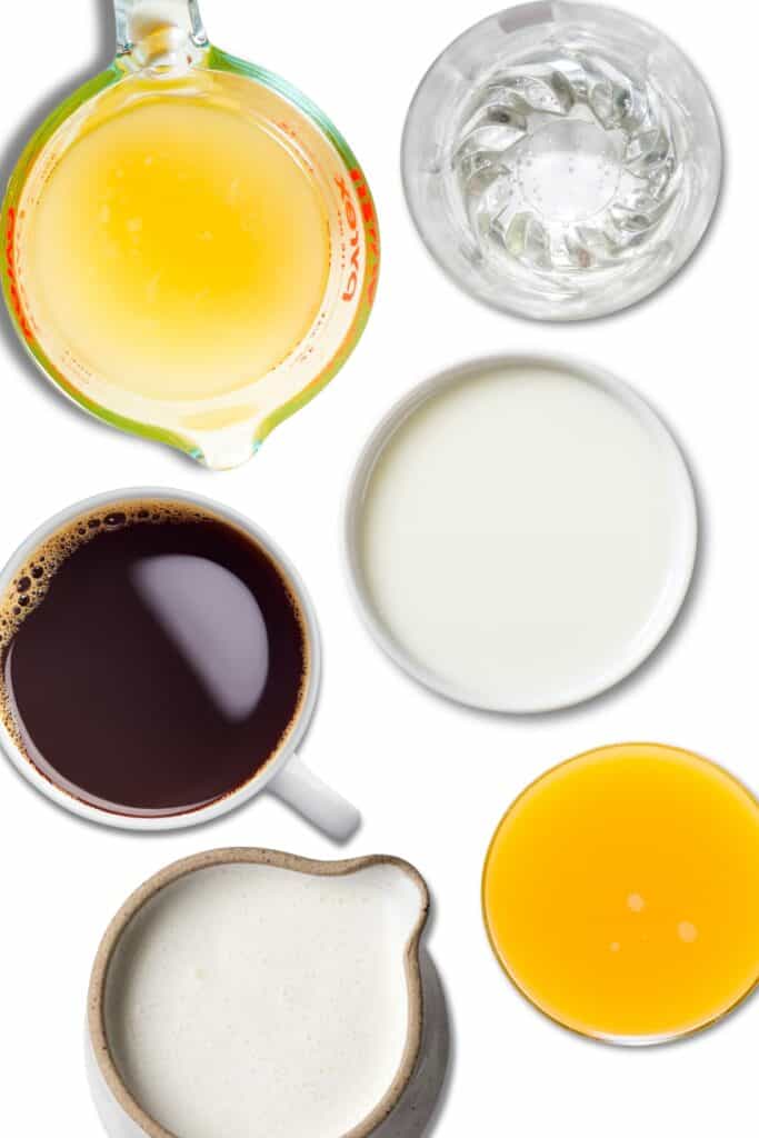 an overhead image of water, milk buttermilk, coffee and orange juice 