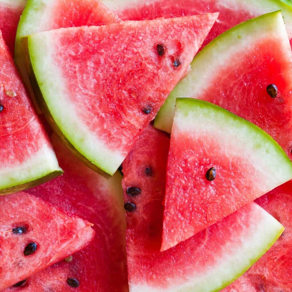 slices of watermelon piled on top of each other