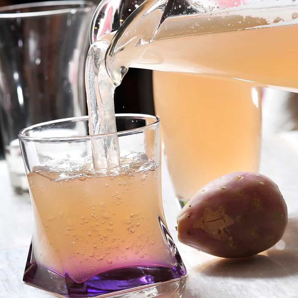 Xoconostle Drink being poured into a glass