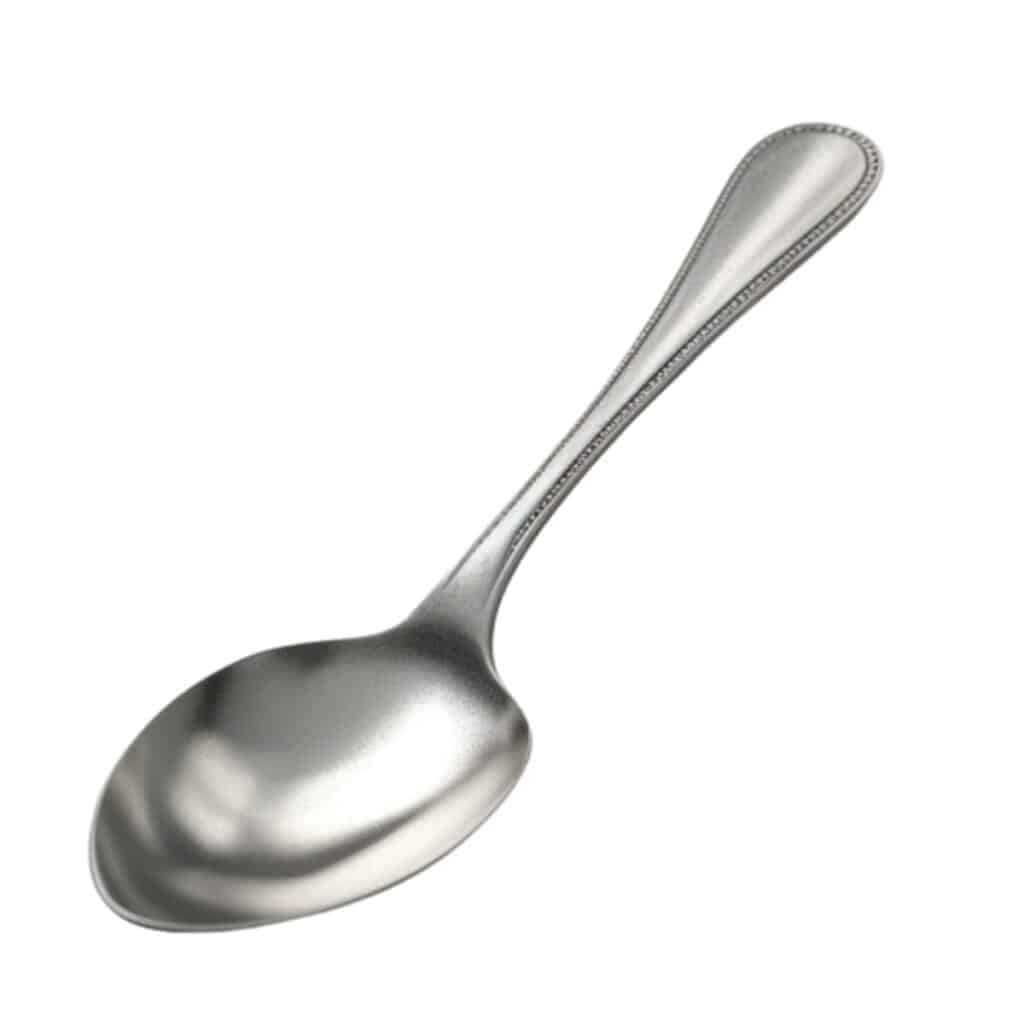 a stainless steel British Dessert Spoon with a white background