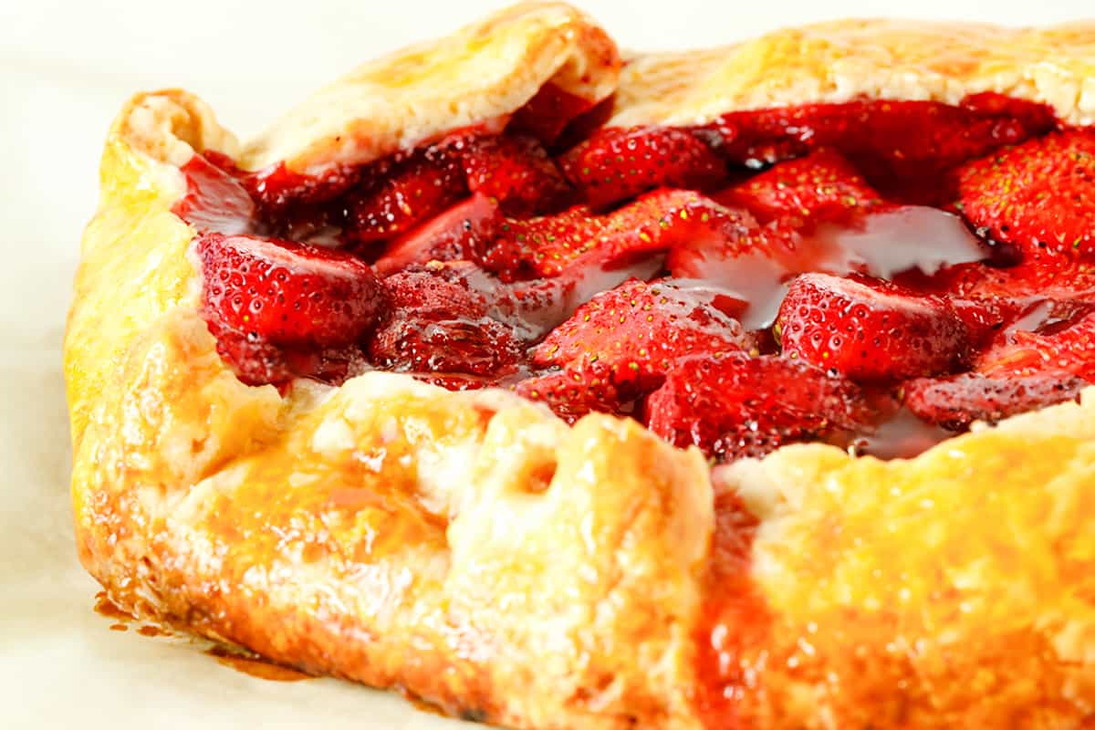 a close up image of a side view of a Strawberry Galette
